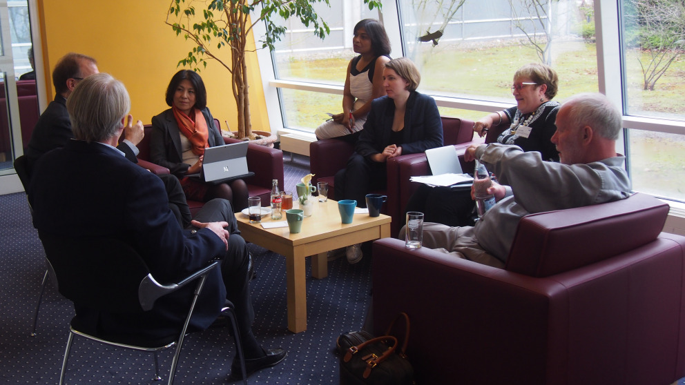 Participants of the Global Sustainability Strategy Forum working in groups.